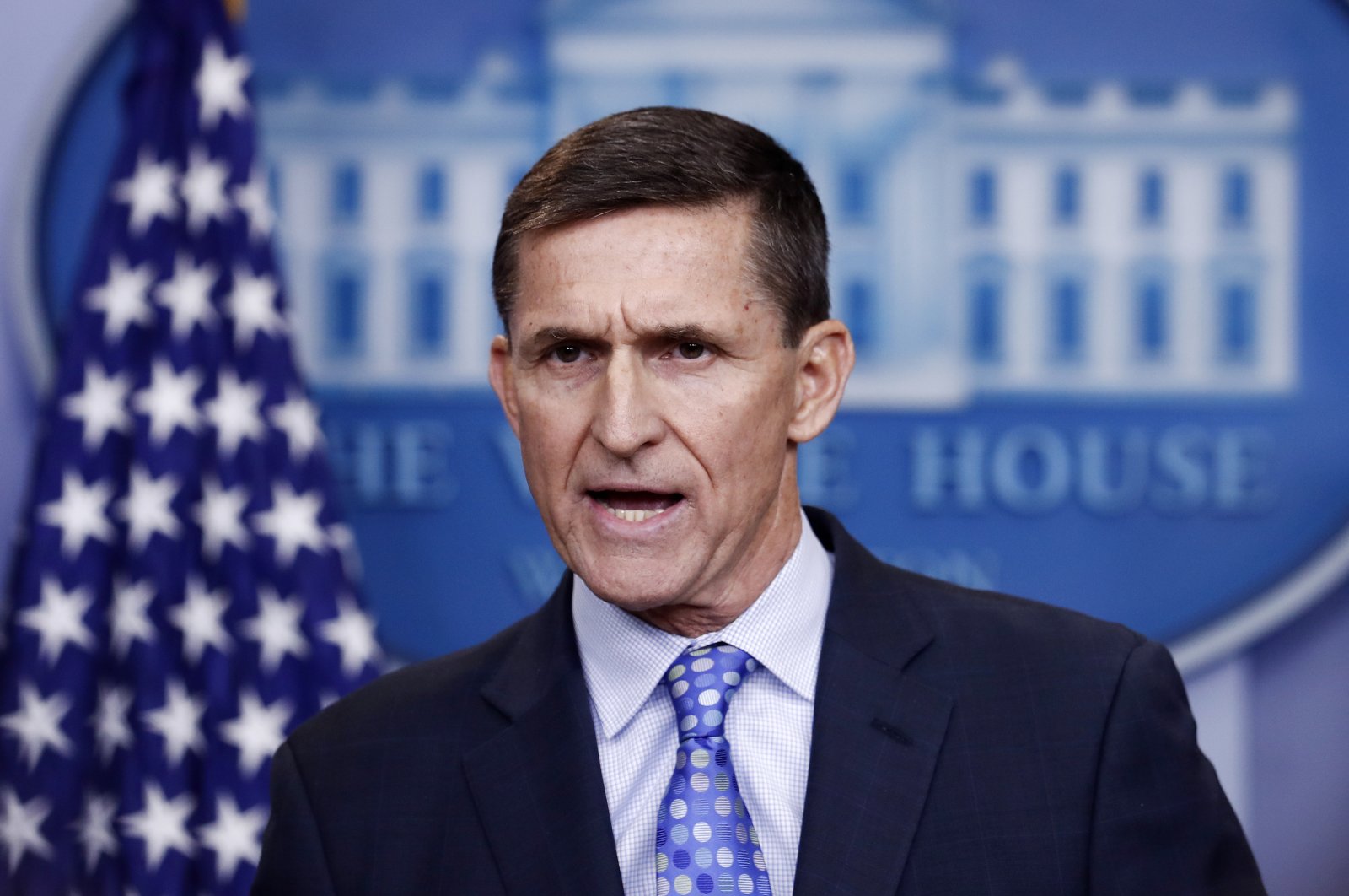 Former U.S. National Security Adviser Michael Flynn speaks during the daily news briefing at the White House, Washington, Feb. 1, 2017. (AP Photo)
