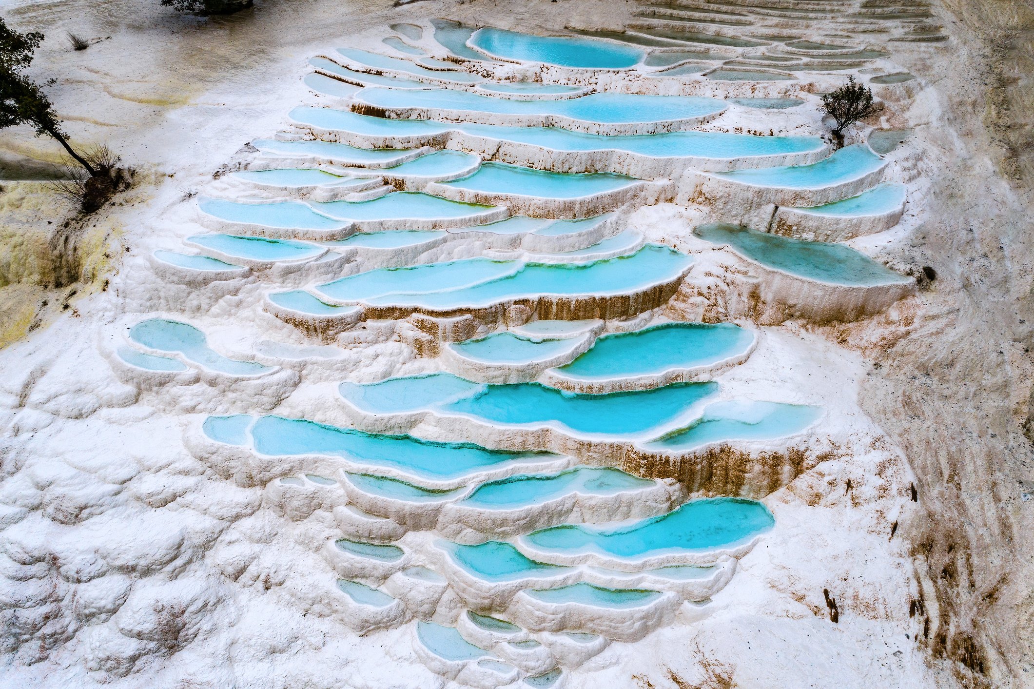 Cascading down nearly 200 meters, the calcium-filled travertines resemble a frozen waterfall. (iStock Photo)