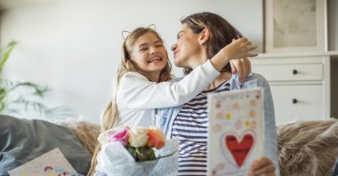 Many children like to surprise their mothers with bouquets of flowers and greeting cards on Mother's Day. (iStock Photo)