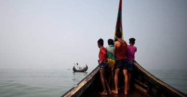 Rohingya refugees crew a fishing boat in the Bay of Bengal near Cox's Bazaar, March 24, 2018. (Reuters Photo)