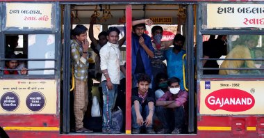 Migrant workers, who were stranded in the western state of Gujarat due to a lockdown imposed by the government to prevent the spread of the coronavirus, are seen inside a parked bus as they wait to board a train that will take them to their home state of eastern Bihar, in Ahmedabad, India, May 8, 2020. (Reuters Photo)