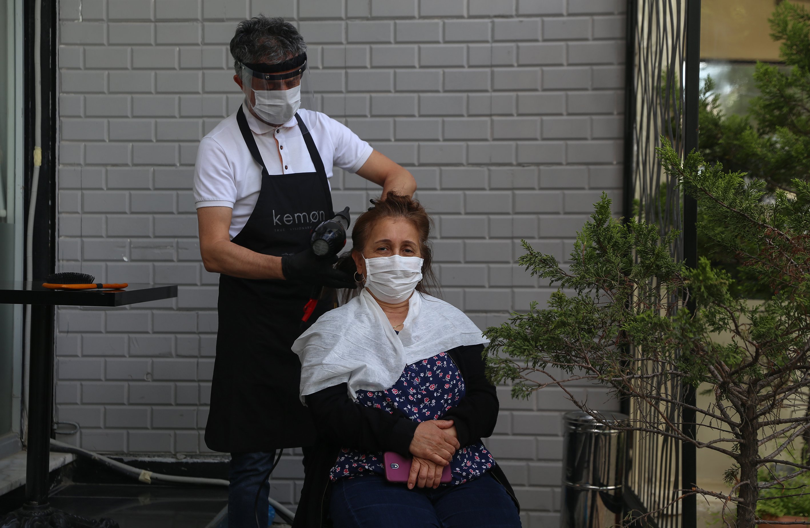 Hairdressers are now operating on an appointment-only system. (AA Photo)