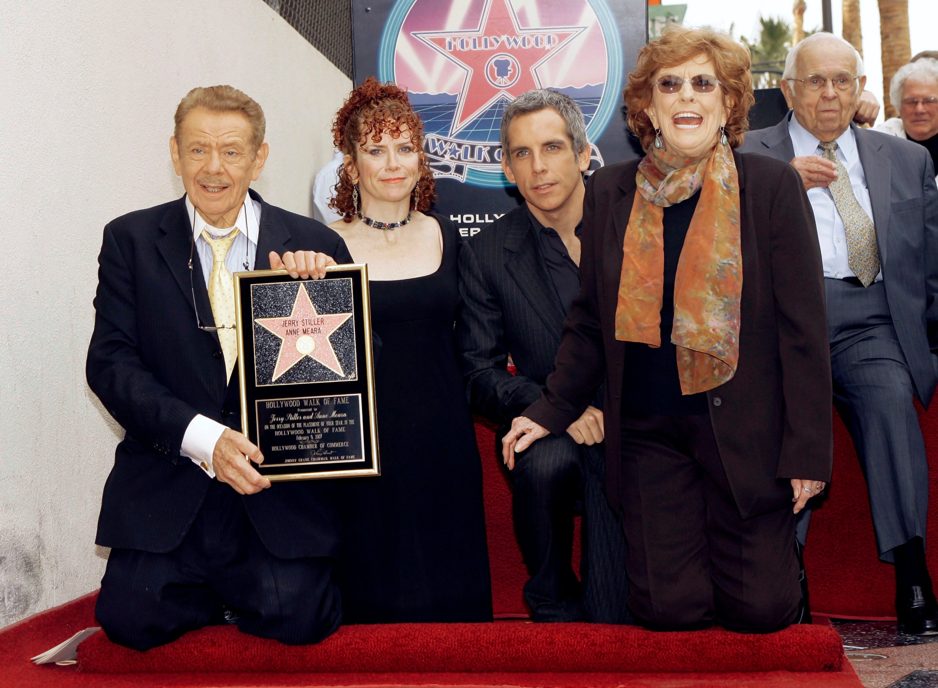 Actors Jerry Stiller (far L) and Anne Meara (2nd R) pose with their children, Ben Stiller and Amy Stiller, as they are honored with a star of the Hollywood Walk of Fame in Los Angeles,  Feb. 9, 2007. (AP Photo)