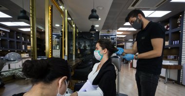 As part of the gradual normalization, barbershops and hairdressers resumed work on May 11, 2020 across Turkey. (AA Photo)