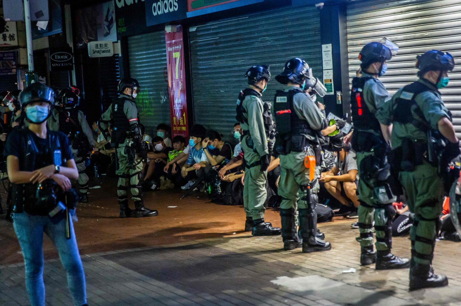 Police detain a group of people during a protest, Hong Kong, May 10, 2020. (AFP Photo)
