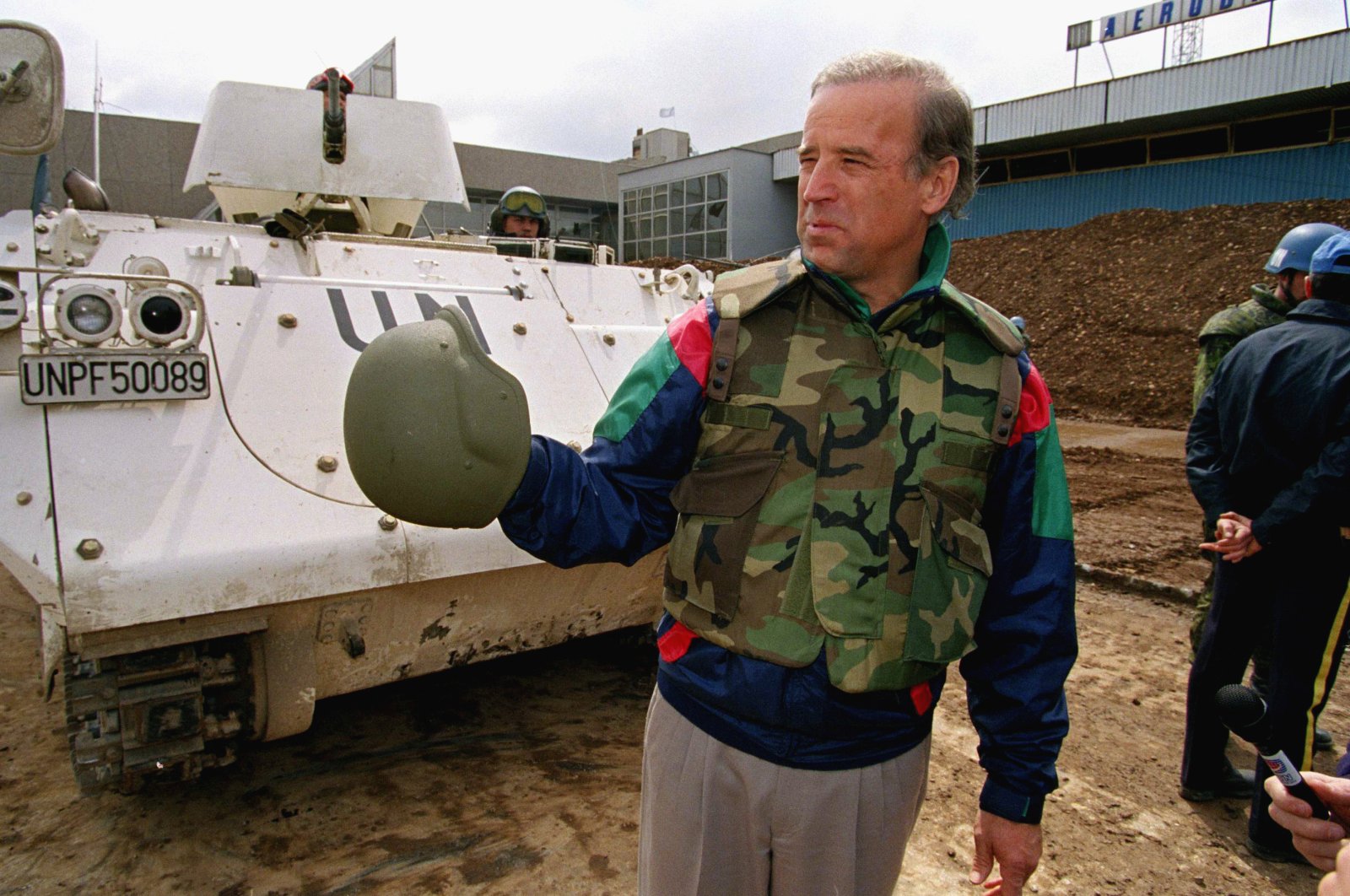 Sen. Joe Biden (D-Del.) stands in front of a Danish armored personnel carrier at the U.N.-controlled Sarajevo Airport, April 9, 1993, making a statement about his trip to the besieged Bosnian capital. (AP Photo)