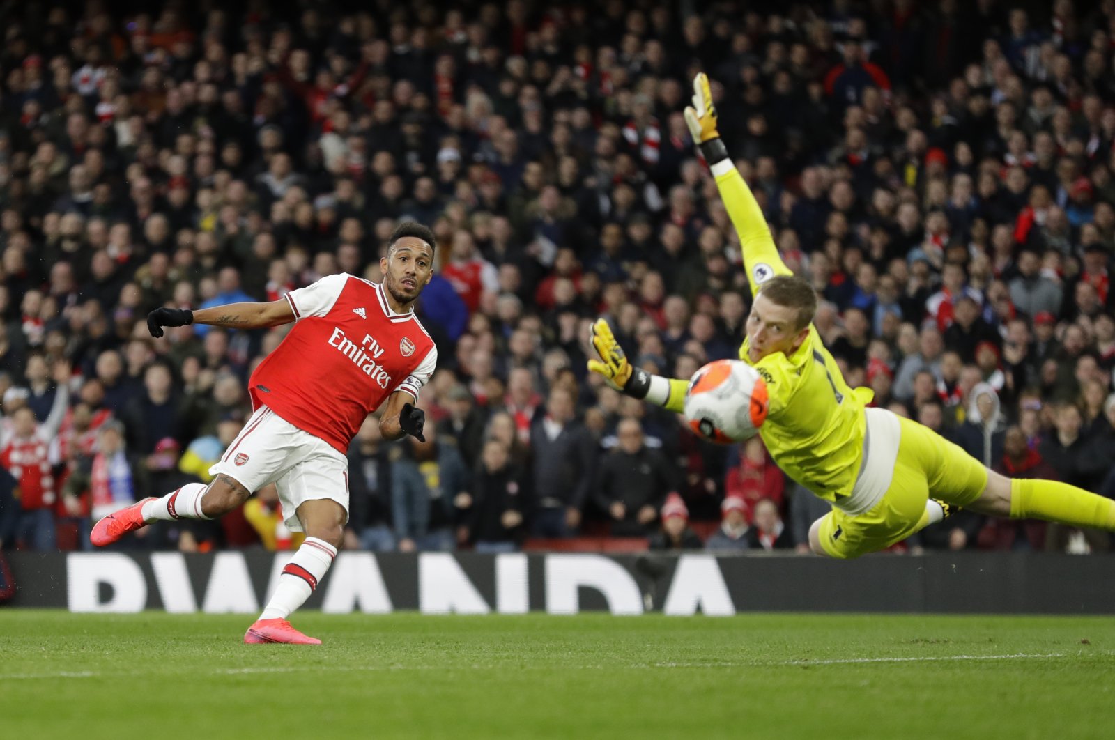 Arsenal's Pierre-Emerick Aubameyang scores a a goal during a Premier League against Everton in London, Feb. 23, 2020. (AP Photo)