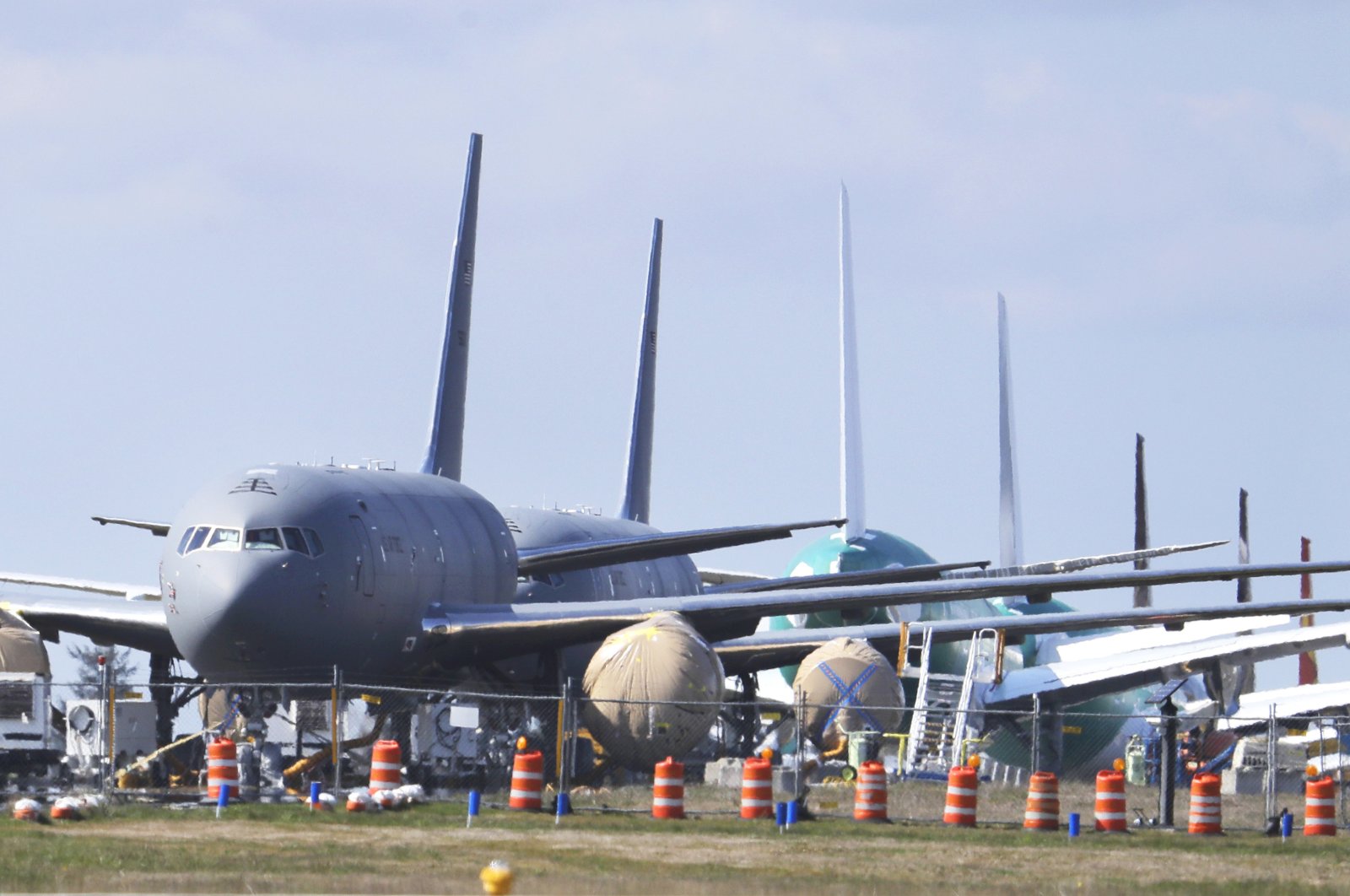 In this April 7, 2020, file photo, U.S. Air Force KC-46 tankers being built by Boeing sit parked at the Paine Field airport in Everett, Wash. (AP Photo)