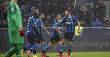 Inter Milan players celebrate a goal during a Serie A match against AC Milan, in Milan, Italy, Feb. 9, 2020. (AP Photo)