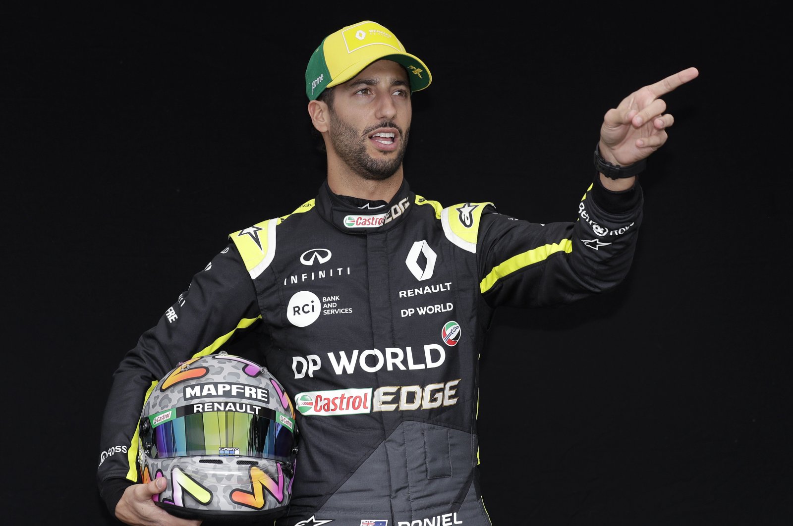 Daniel Ricciardo poses for a photo at the Australian GP in Melbourne, March 12, 2020. (AP Photo)