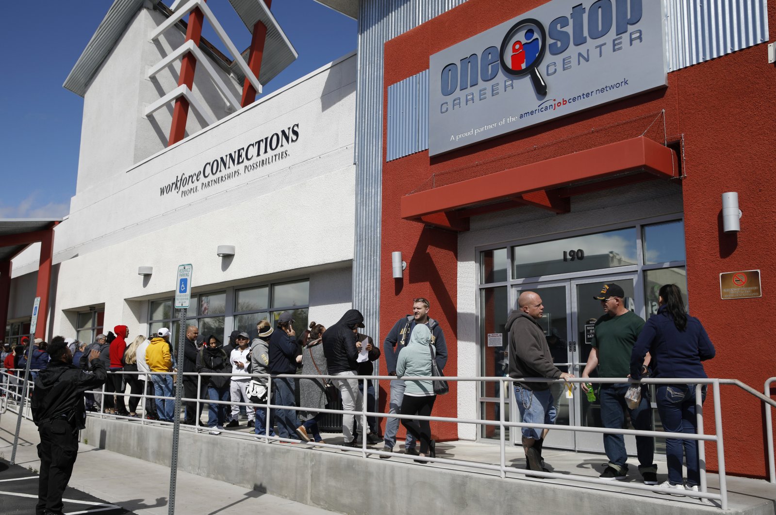 People wait in line for help with unemployment benefits at the One-Stop Career Center in Las Vegas, Nevada, U.S., March 17, 2020. (AP Photo)