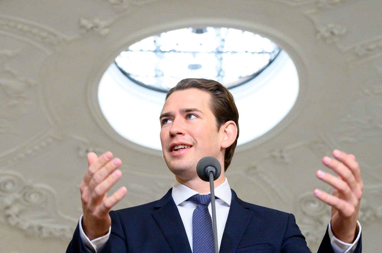 Sebastian Kurz, leader of Austria's People's Party (OeVP) speaks to journalists as he arrives for exploratory talks with Green Party leader Werner Kogler (Unseen) at Winter Palace in Vienna, Austria, Oct. 13, 2019. (AFP Photo)