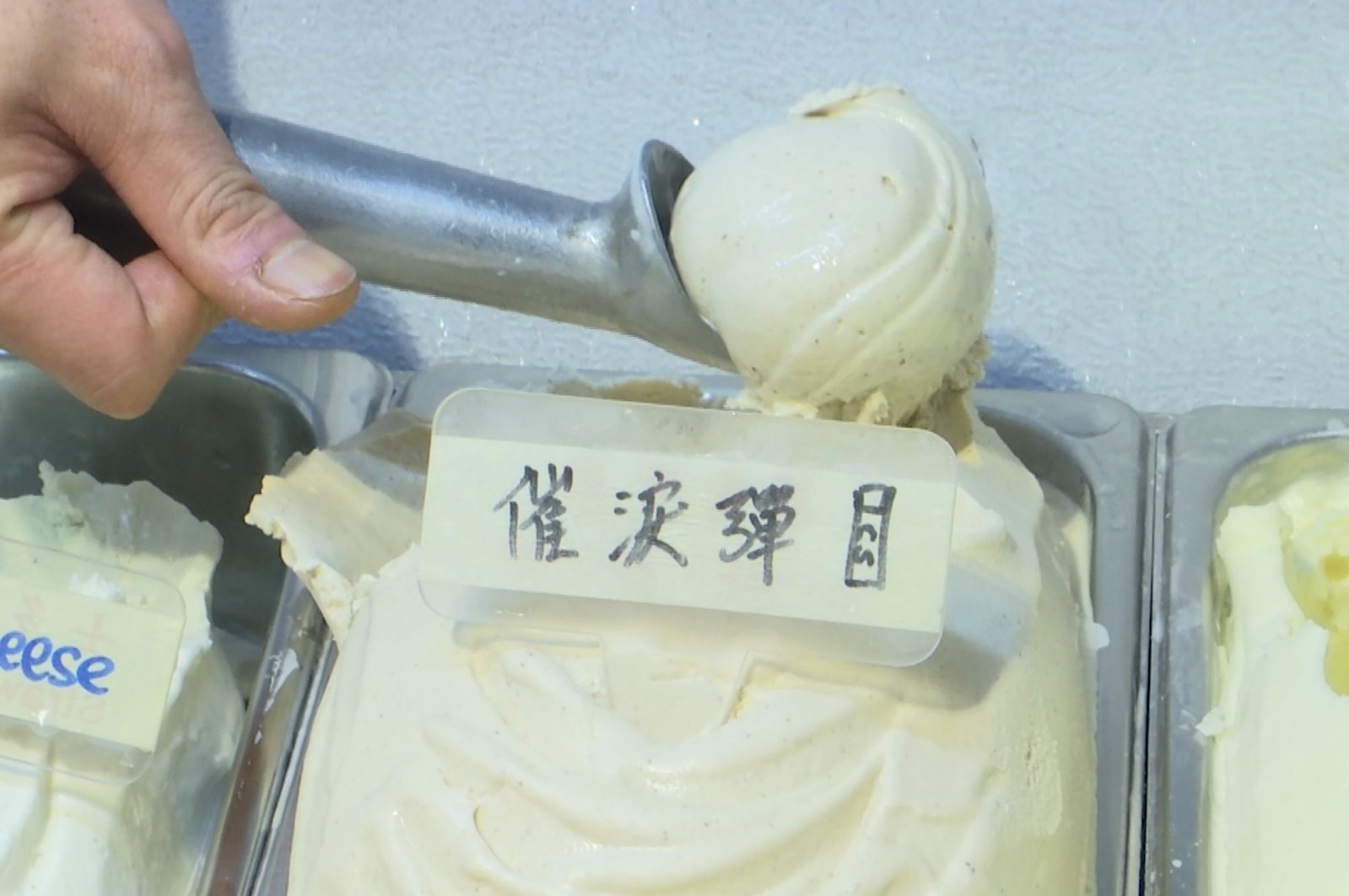 A scoop of tear gas flavored ice cream, in Hong Kong, May 4, 2020. (AP Photo)