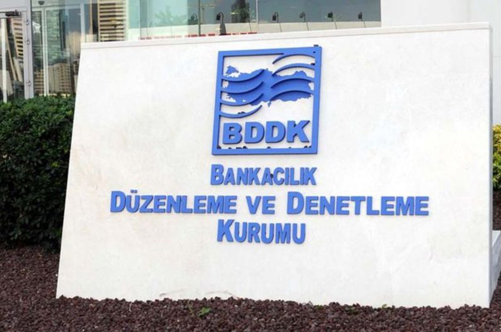 The Banking Regulation and Supervision Agency's (BDDK) logo is seen in front of its Istanbul headquarters.