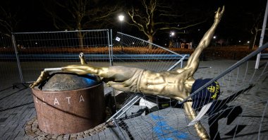 The statue of soccer player Zlatan Ibrahimovic is seen sawn down and destroyed, at the square next to a football arena in Malmo, Sweden, Jan. 5, 2020. (Reuters Photo)