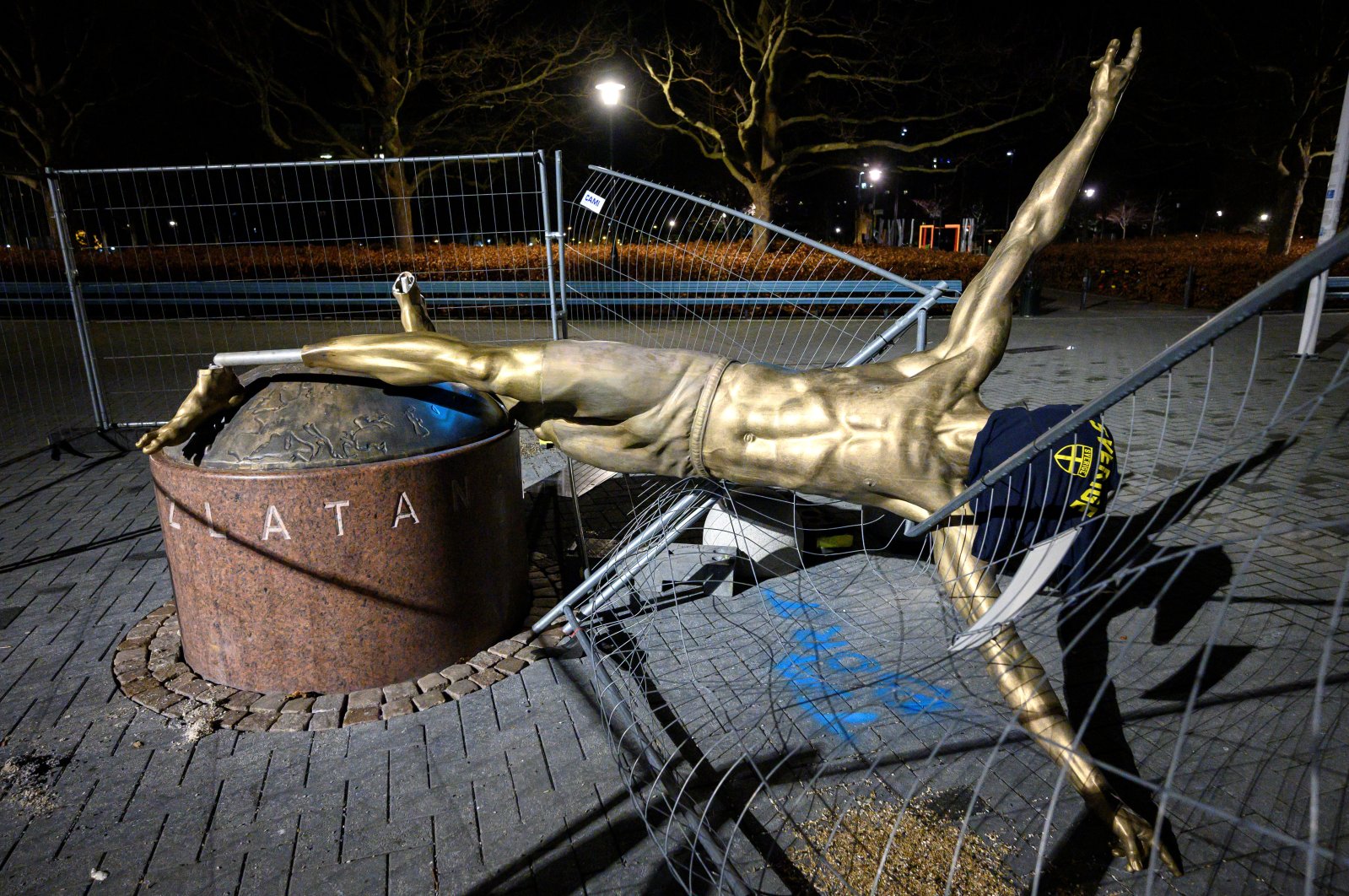 The statue of soccer player Zlatan Ibrahimovic is seen sawn down and destroyed, at the square next to a football arena in Malmo, Sweden, Jan. 5, 2020. (Reuters Photo)