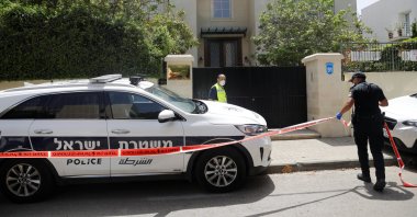 An Israeli policeman cordons off an area near the house of China's ambassador to Israel, Du Wei, in Herzliya, near Tel Aviv, Israel May 17, 2020. (Reuters Photo) 