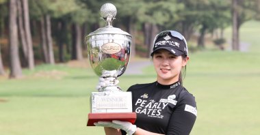Park Hyun-kyung poses with the trophy after winning the final round of the KLPGA Championship golf tournament at Lakewood Country Club in Yangju, South Korea, May 17, 2020. (EPA Photo)