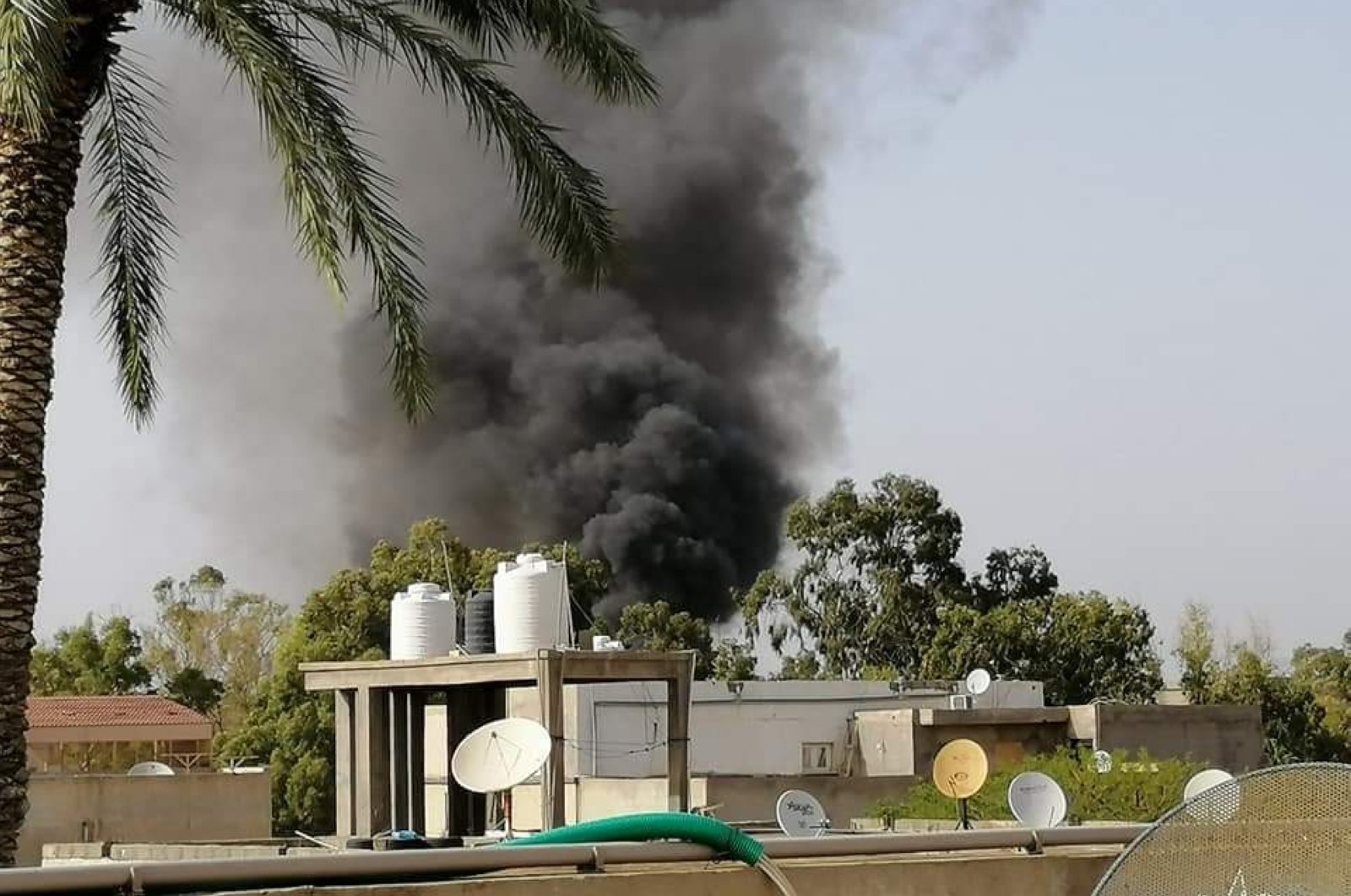 Seven people were killed in an attack by warlord Khalifa Haftar on a shelter for displaced people in Fornaj district, Tripoli, Libya, May 16, 2020. (IHA Photo)
