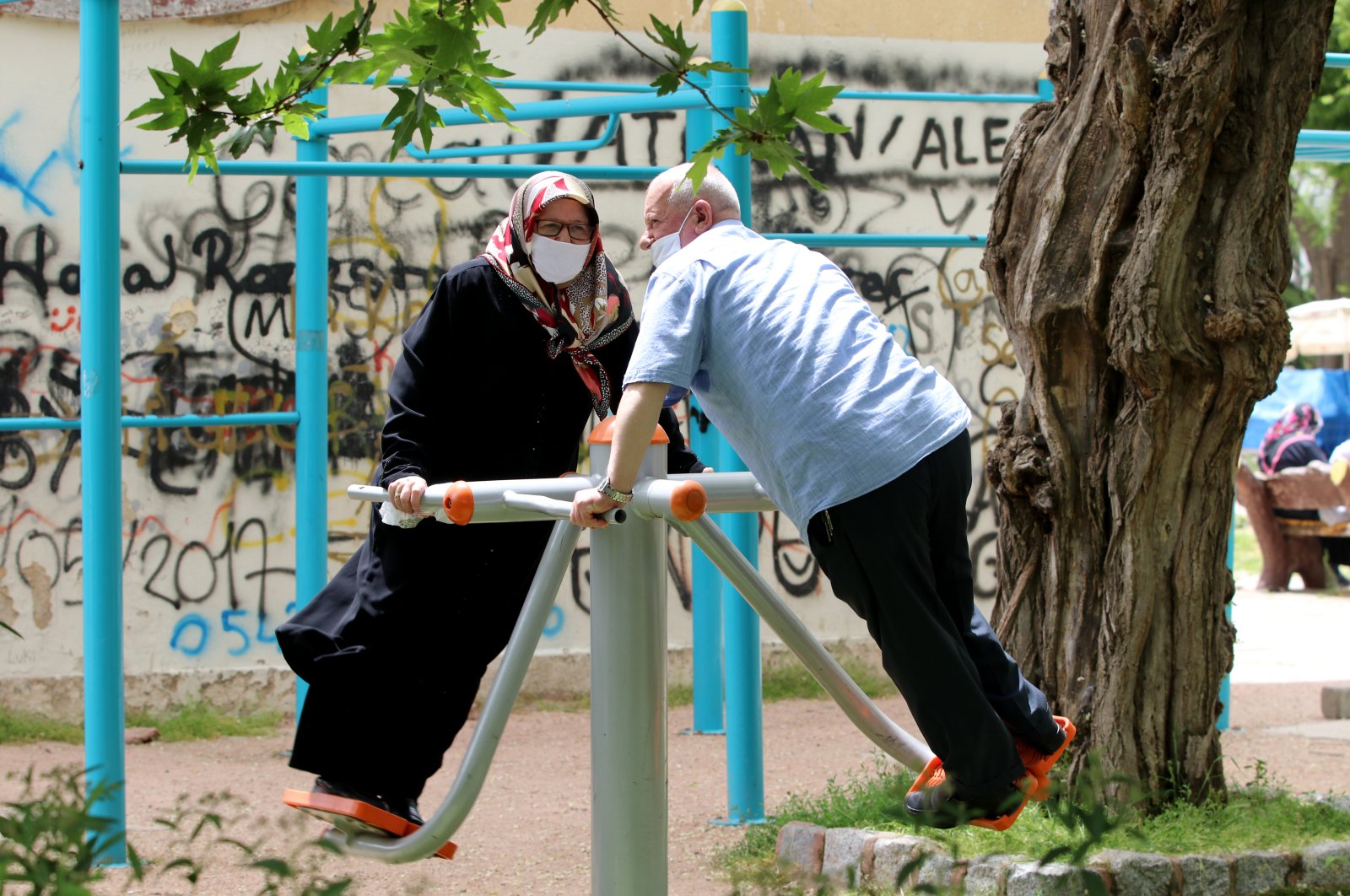 A senior couple exercises at a local park in Tekirdağ, Turkey, May, 17, 2020. (AA Photo)