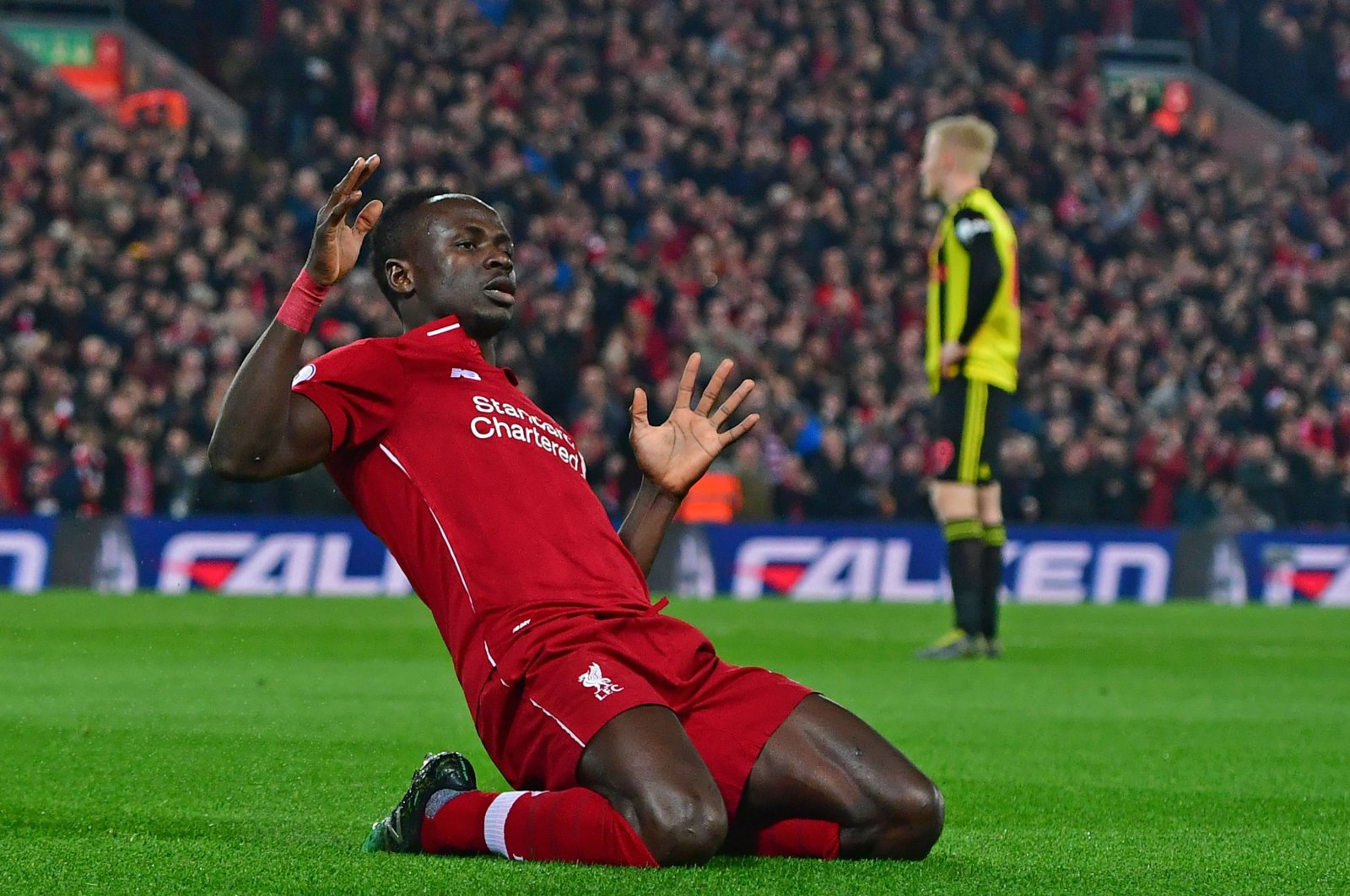 In this file photo taken on February 27, 2019 Liverpool's Senegalese striker Sadio Mane celebrates after scoring the opening goal of the English Premier League football match between Liverpool and Watford at Anfield in Liverpool, northwest England. (AFP Photo)