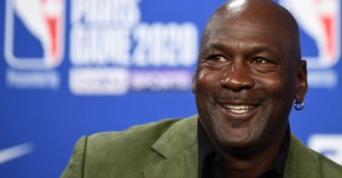 In this file photo former NBA star and owner of Charlotte Hornets team Michael Jordan looks on as he addresses a press conference ahead of the NBA basketball match between Milwaukee Bucks and Charlotte Hornets at The AccorHotels Arena in Paris on January 24, 2020. (AFP Photo)