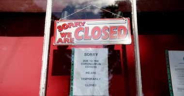 A closed sign is seen in a shop window in Dunham Massey, following the outbreak of the coronavirus disease, Dunham Massey, Britain, May 7, 2020. (Reuters Photo)