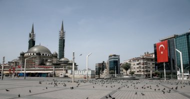 A view of Taksim Square, otherwise one of the busiest venues in Istanbul, on the third day of a coronavirus curfew, May 18, 2020. (AA Photo)