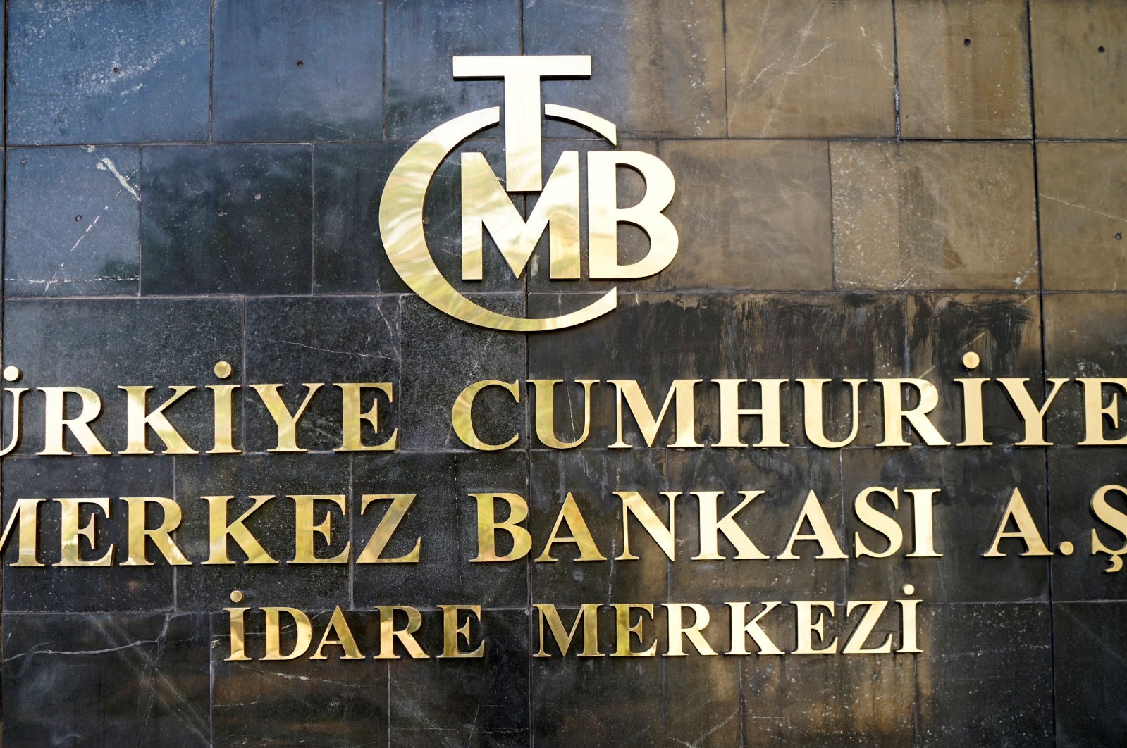 A logo of the Central Bank of the Republic of Turkey is pictured at the entrance of the bank's headquarters in Ankara, Turkey, April 19, 2015. (Reuters Photo)