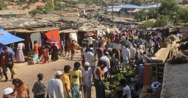 Rohingya refugees shop for vegetables at Kutupalong Rohingya camp bazaar, Cox’s Bazar, Bangladesh, May 15, 2020. (AP Photo)