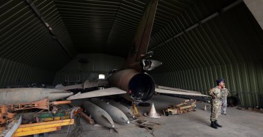 Members of Libya's internationally recognized government are seen after taking control of al-Watiya air base, southwest of Tripoli, Libya, May 18, 2020. (Reuters Photo)