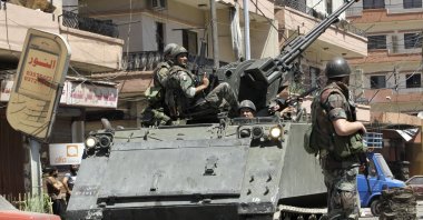 Lebanese army soldiers patrol after days of clashes between pro and anti-Syrian regime groups, in the northern city of Tripoli, Lebanon, Aug. 23, 2012. (AP Photo)