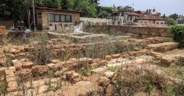 The graves were found during excavations to unearth the madrasah gate at Yivli Minare Mosque, Antalya, Turkey. (DHA Photo)