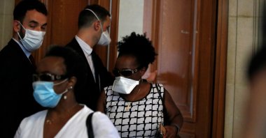 Relatives of Rwandan genocide suspect Felicien Kabuga arrive at the Paris courthouse before the initial extradition hearing for Felicien Kabuga in Paris, France, May 20, 2020. (Reuters Photo)