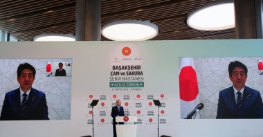Turkish President Recep Tayyip Erdoğan speaks to Japanese Prime Minister Shinzo Abe in a video call during the opening ceremony of the Başakşehir Pine and Sakura City Hospital, Istanbul, Turkey, May 21, 2020. (AA Photo) 