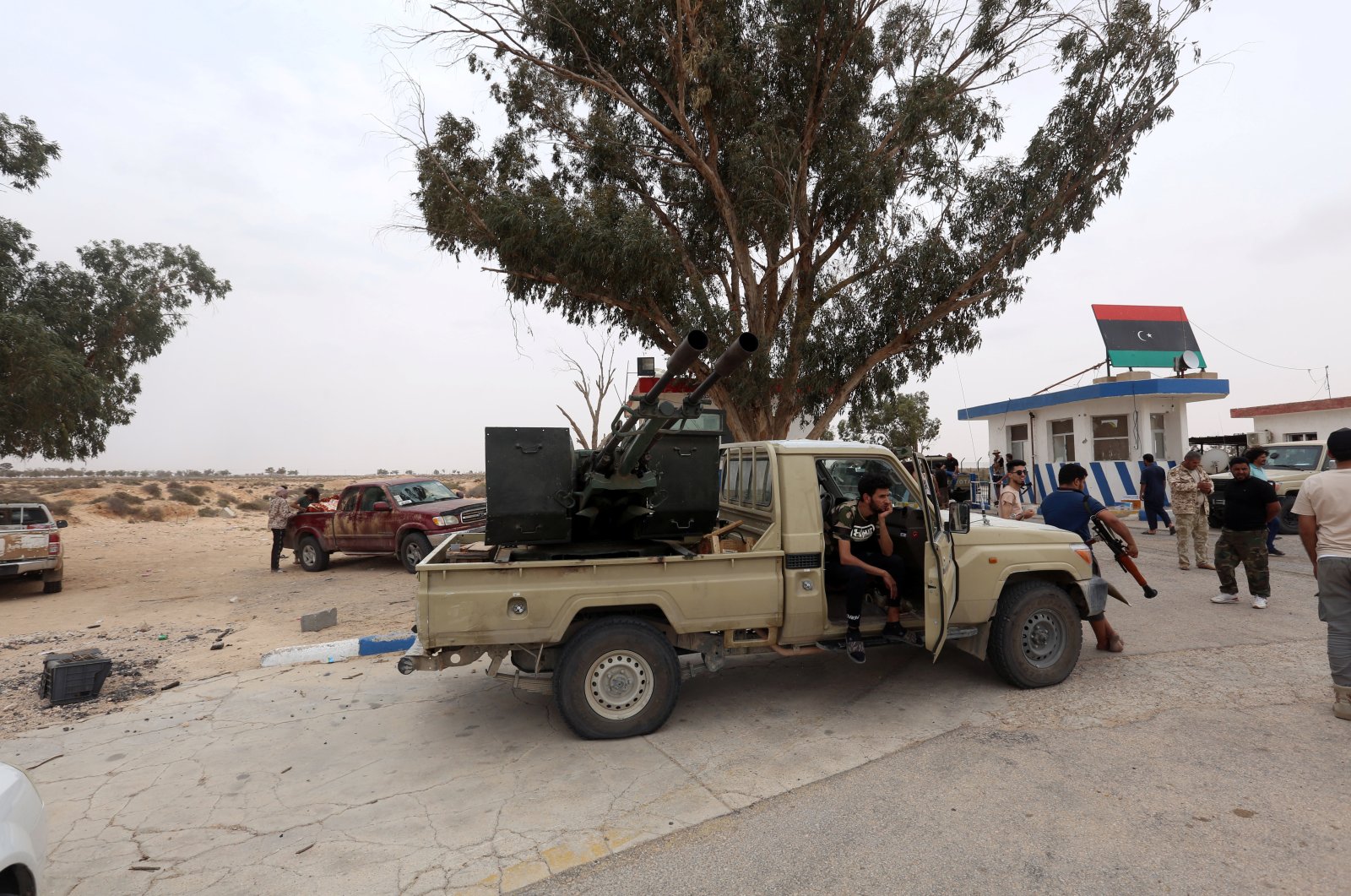 Fighters loyal to Libya's internationally recognised government are seen after taking control of Watiya airbase, southwest of Tripoli, Libya May 18, 2020. (REUTERS)