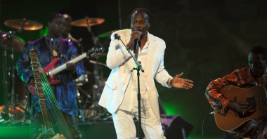 Guinea's singer Mory Kante performs at a Roman theater during the 46th International Festival of Carthage, Carthage, July 14, 2010. (AFP Photo)
