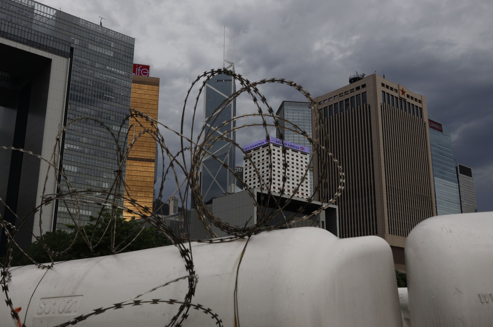 The People's Liberation Army's (PLA) central barracks building (R) is seen in the Hong Kong skyline, May 22, 2020. (AP Photo)