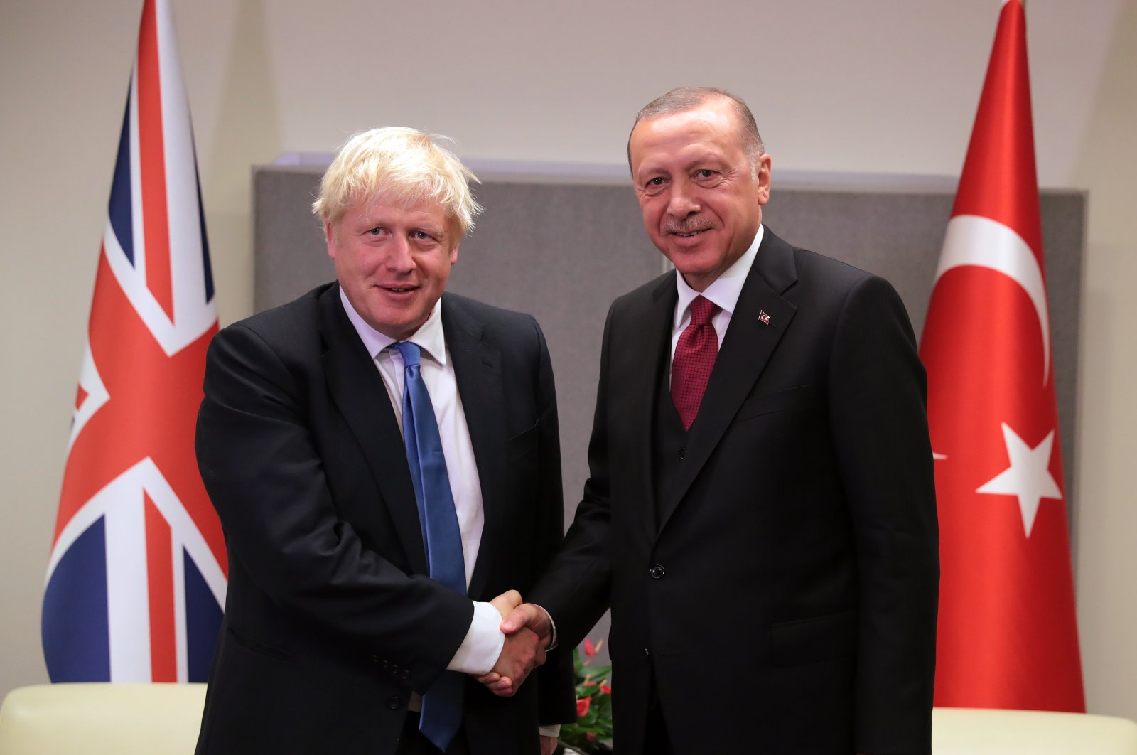 President Recep Tayyip Erdoğan and British Prime Minister Boris Johnson shake hands in a meeting on the sidelines of the 74th General Assembly of the United Nations, New York City, U.S., September 2019. (IHA Photo)