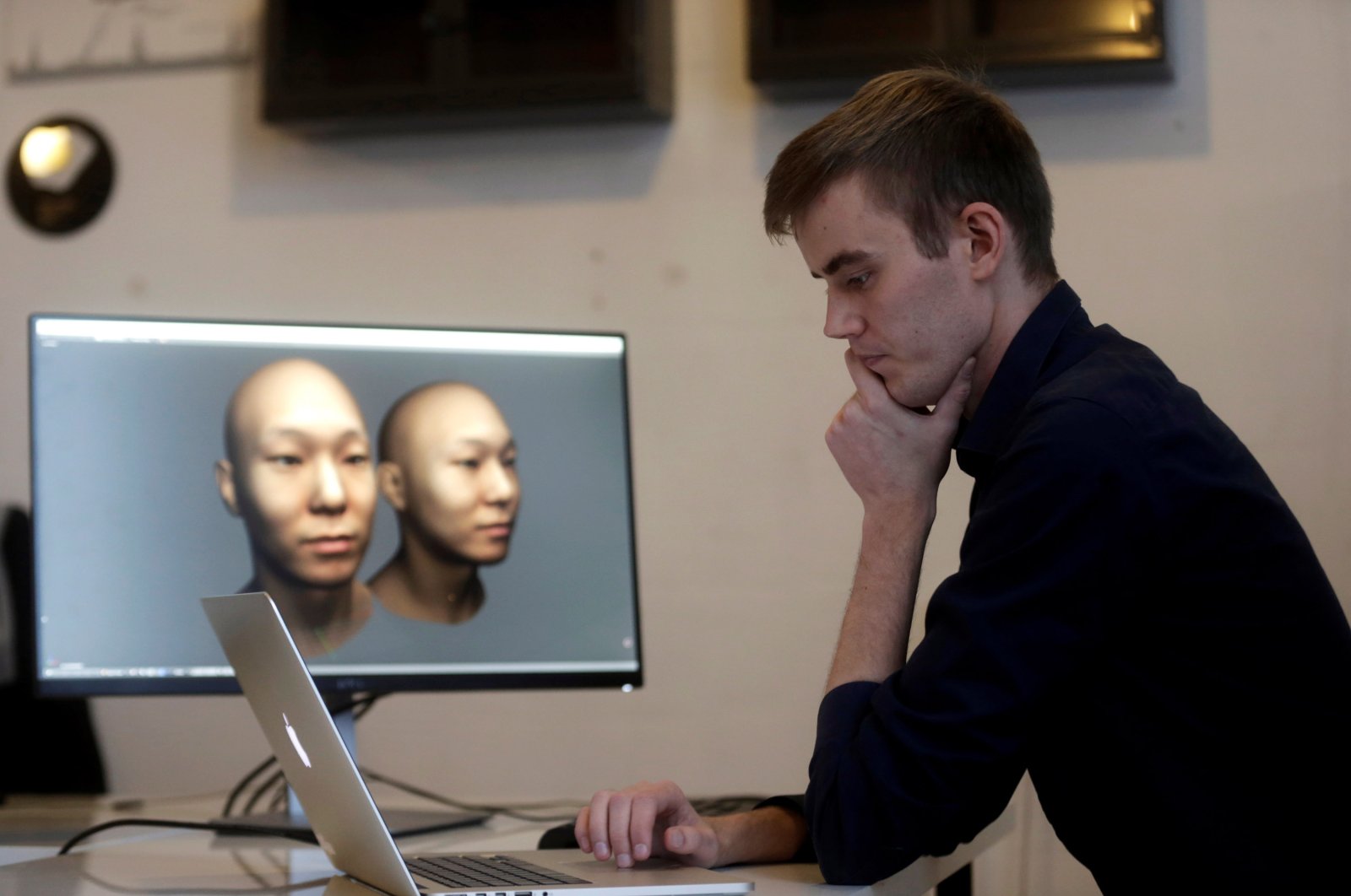 Rainer Selvet inspects 3D virtual reality renderings in Tallinn, Estonia, Nov. 8, 2016. (Reuters Photo)