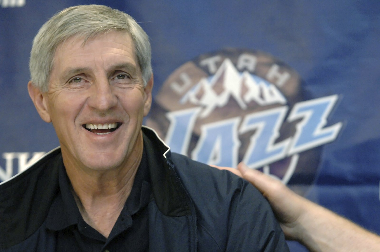 Utah Jazz coach Jerry Sloan smiles during a news conference in Salt Lake City, Utah, May 12, 2005. (AP Photo)