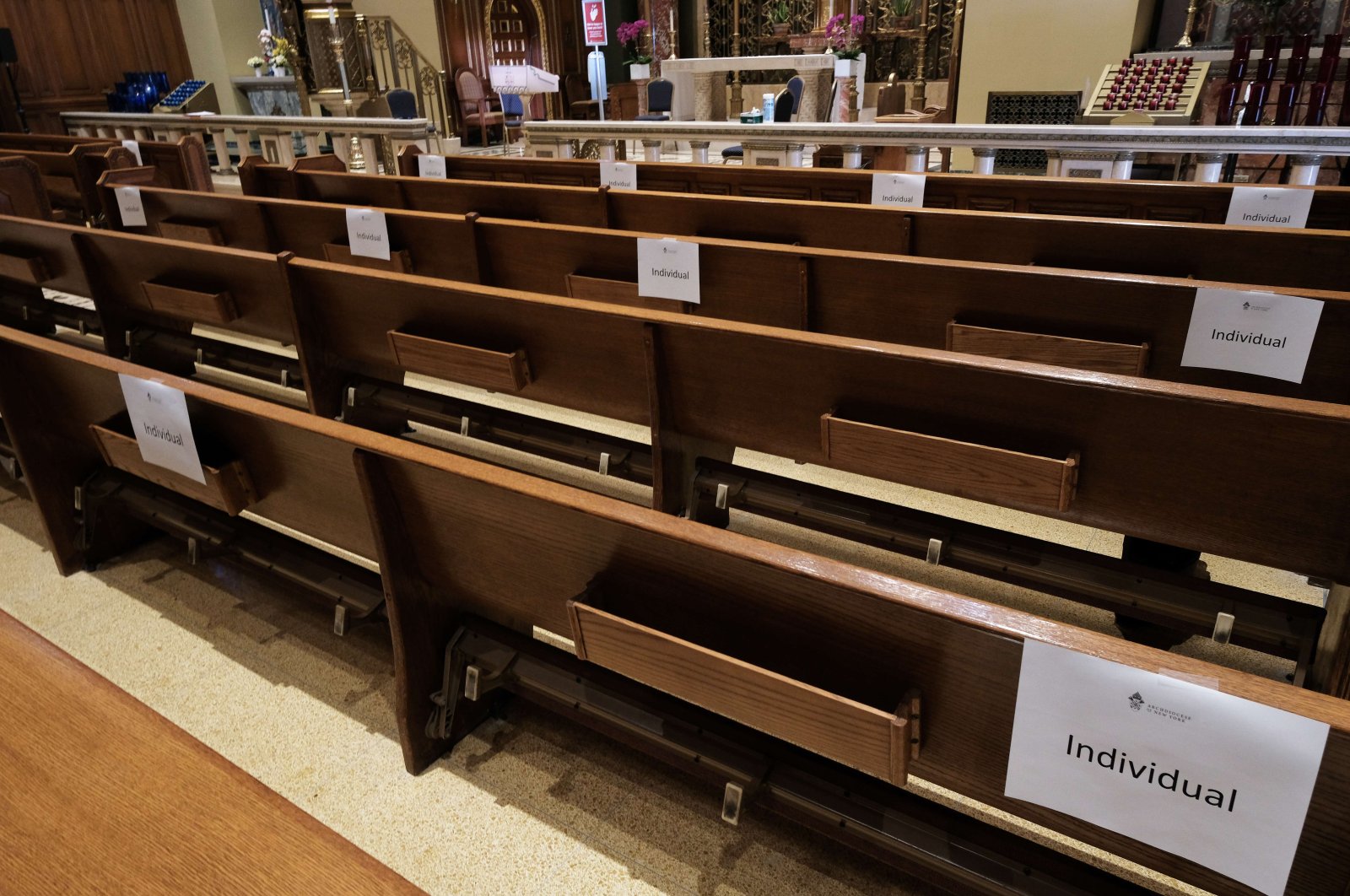 Social distancing protections are displayed at Our Savior Parish in New York, May 21, 2020. (AFP Photo) 
