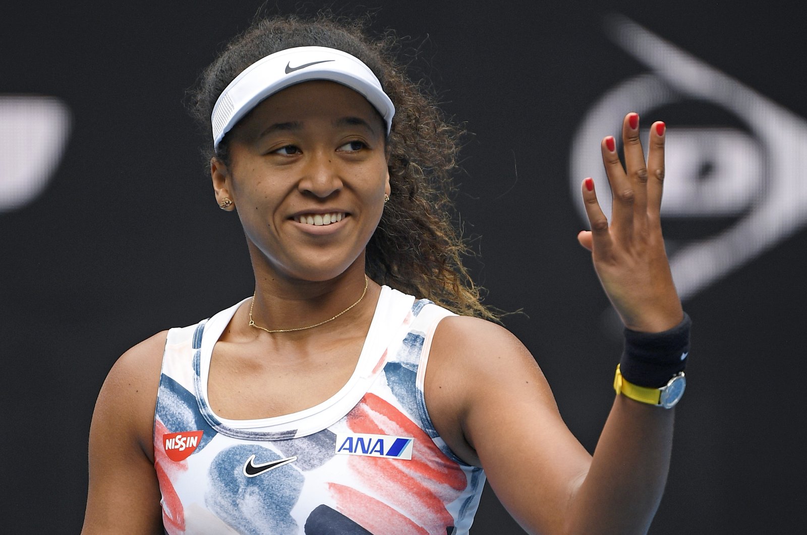 Japan's Naomi Osaka reacts after defeating China's Zheng Saisai in their second-round singles match at the Australian Open tennis championship, Melbourne, Australia, Jan. 22, 2020. (AP Photo)