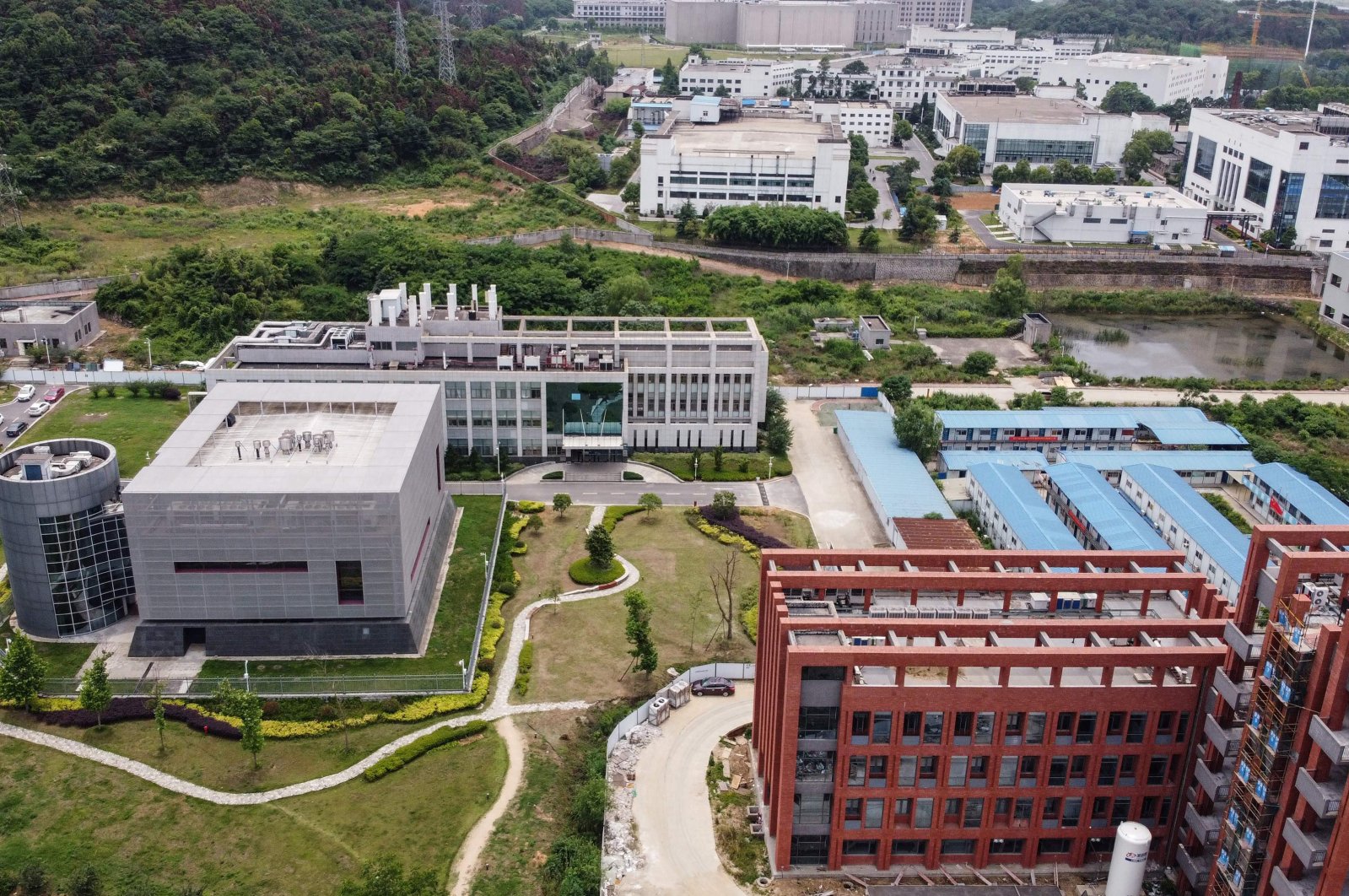 This aerial view shows the P4 laboratory (L) on the campus of the Wuhan Institute of Virology, Wuhan, central Hubei province, China, May 13, 2020. (AFP Photo)