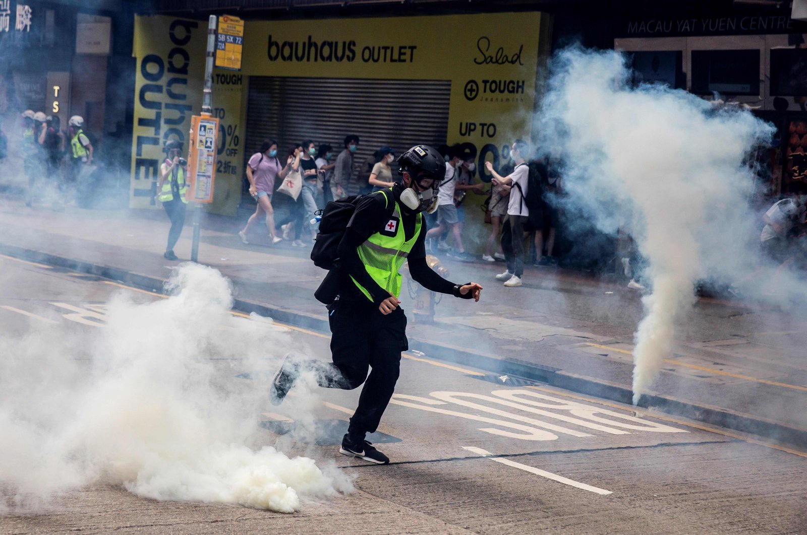  Police fire tear gas on protesters during planned protests against a proposal to enact a new security legislation in Hong Kong on May 24, 2020. (AFP Photo)