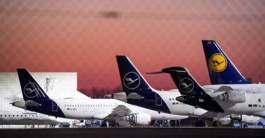 This picture released on March 26, 2020, shows Lufthansa aircraft parked at the airport in Munich, Germany on March 25, 2020. (EPA Photo)
