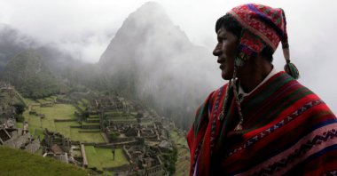 A Quechua musician stands next to the Machu Picchu ruins, Peru, April 1, 2010. (Reuters Photo)