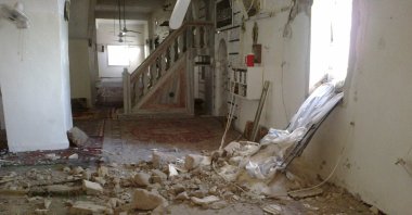Damaged is seen inside the grand mosque after shelling by Bashar Assad regime's forces at Houla near Homs, Sept. 9, 2012.