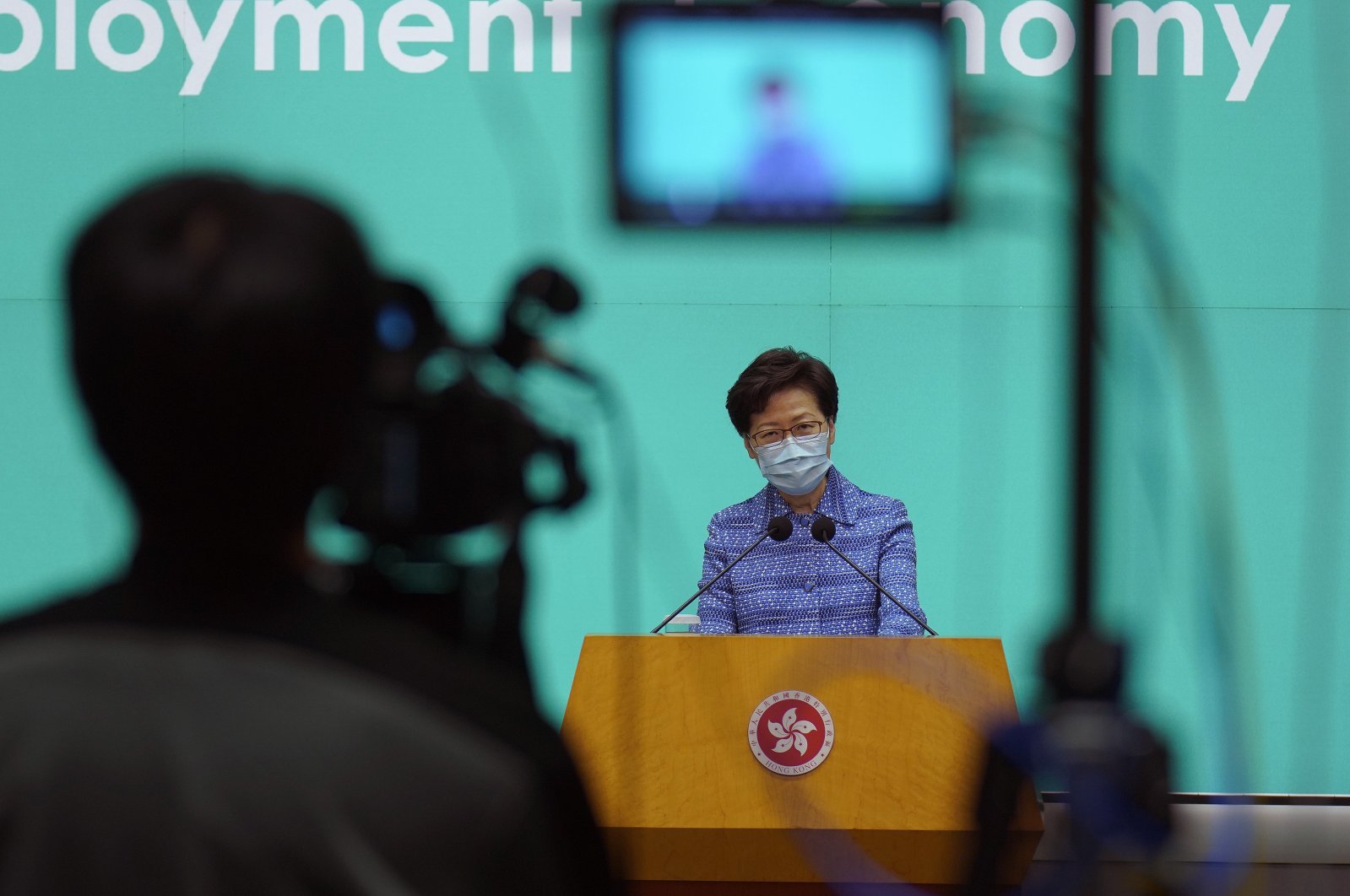 Hong Kong Chief Executive Carrie Lam listens to reporters' questions during a press conference in Hong Kong, Tuesday, May 26, 2020. (AP Photo)