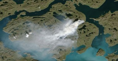 NOAA satellite photo showing cloud of smoke from wildfire in western Greenland (Handout NOAA/AFP File Photo)